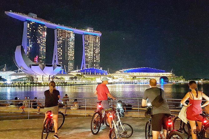 Marina Bay Night Cycling Tour - Fullerton Hotel and Esplanade: colonial lines plus theater vibes