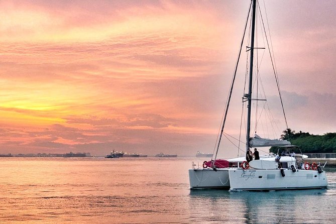 Singapore Sunset and Moring Cruise On A Luxury Catamaran - Weather reality: rain or shine, but not in unsafe conditions