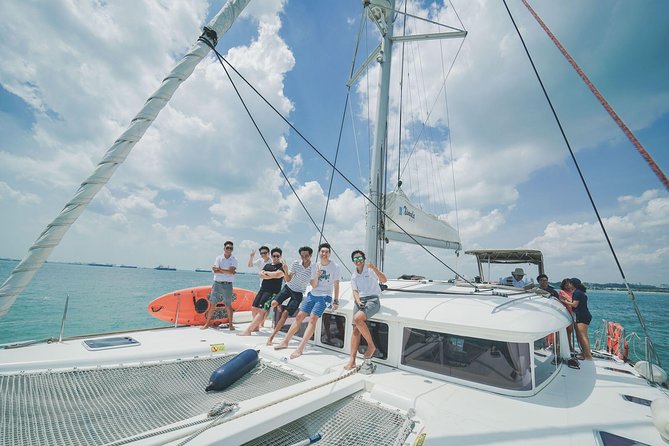 Singapore Sunset and Moring Cruise On A Luxury Catamaran - Entering the boat experience: what’s included, what you pay for, and the footwear rule